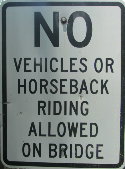 No-vehicles-or-horseback-riding-allowed-on-bridge-sign-Longleaf-Trace-MS-2015-06-11