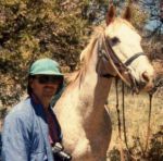 Jim-Schmid-next-to-horse-on-trail-ride-Sunflower-AZ-1991